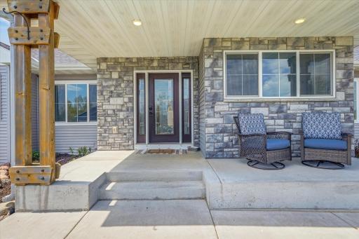 Enjoy your morning coffee or evening sunsets from the charming covered front porch.