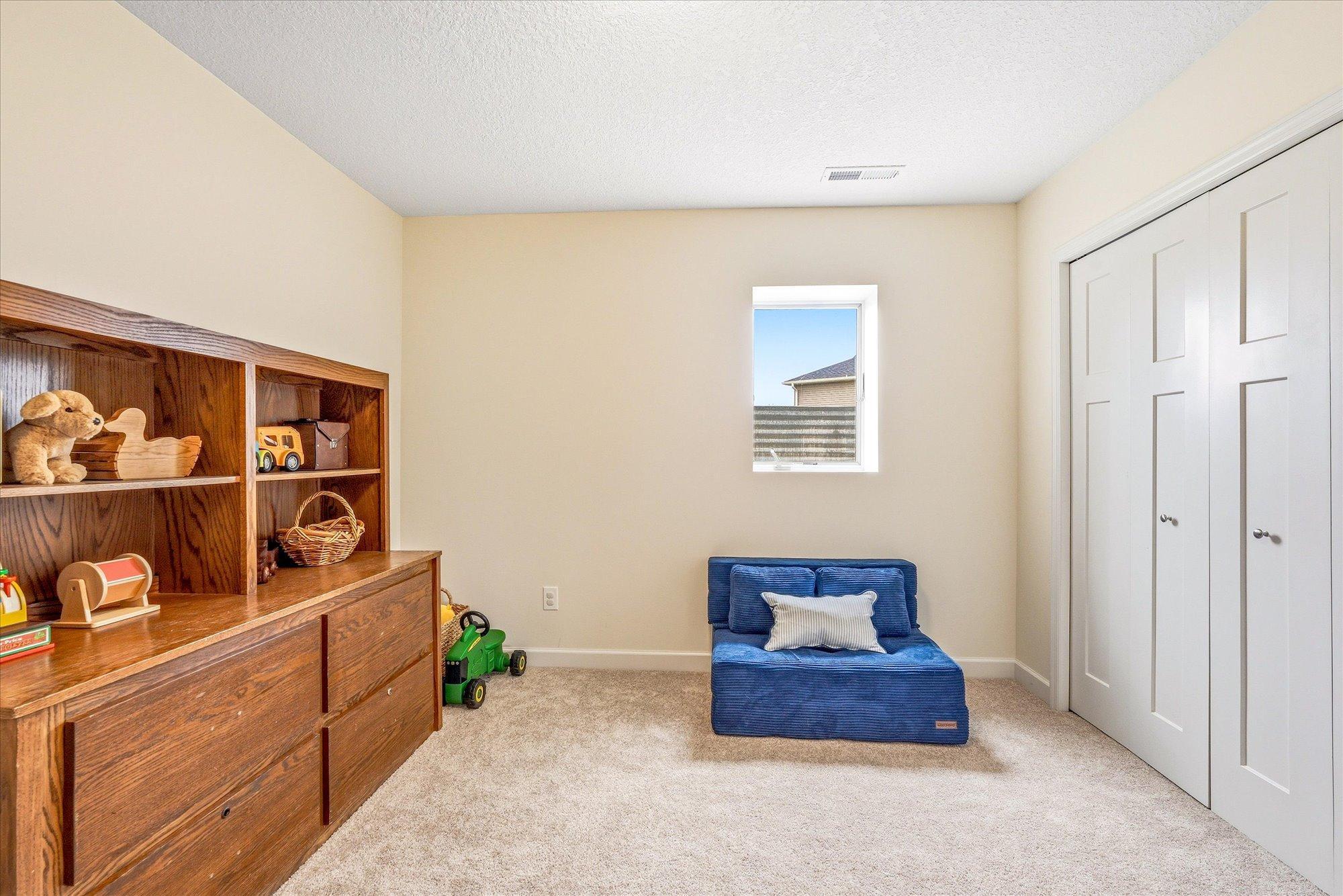 The 4th bedroom is also in the lower level. Both bedrooms features plush carpet and nice size closets.