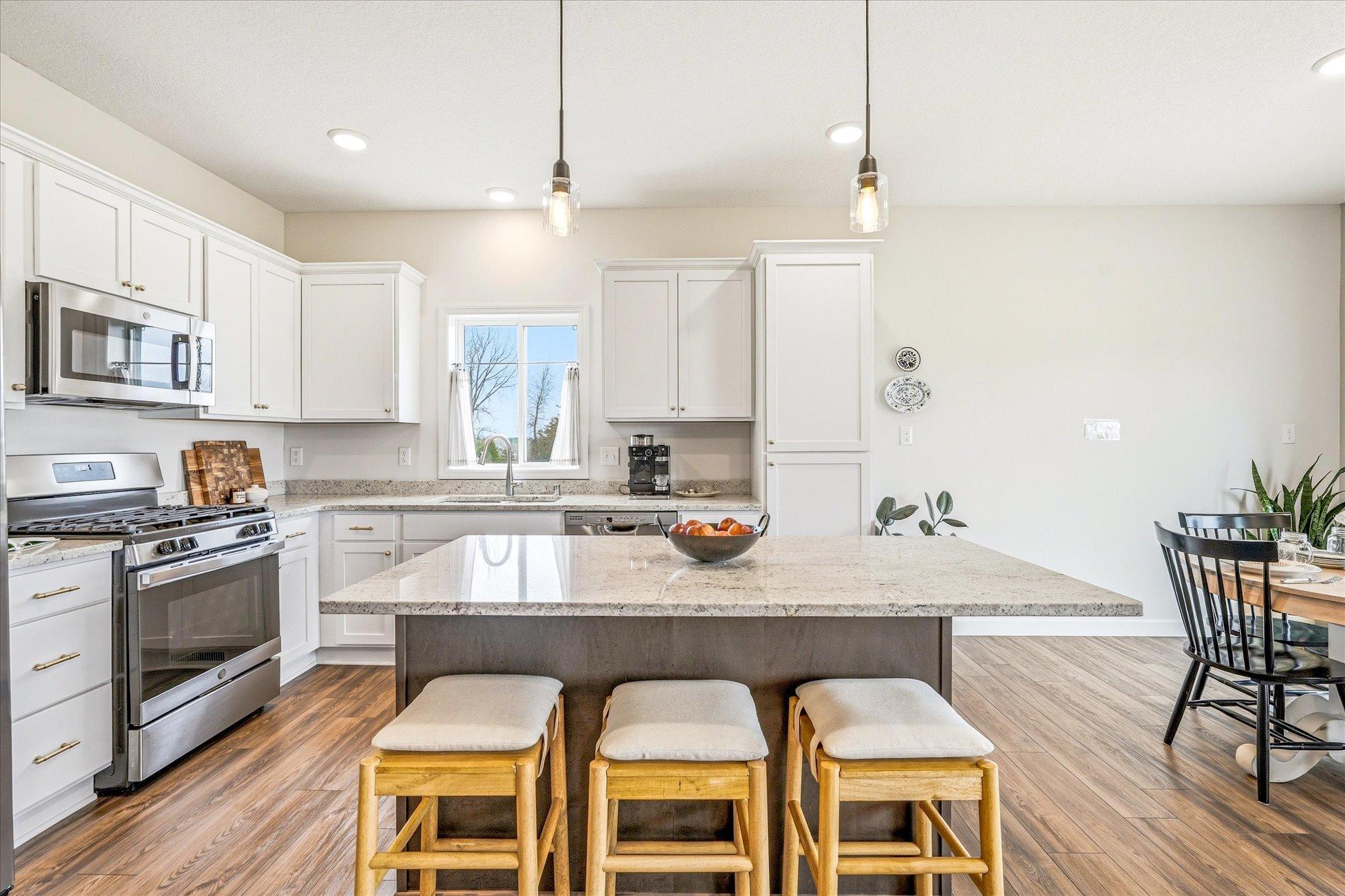 All of the cabinets feature soft closed doors and drawers, and a pull out trash bin.