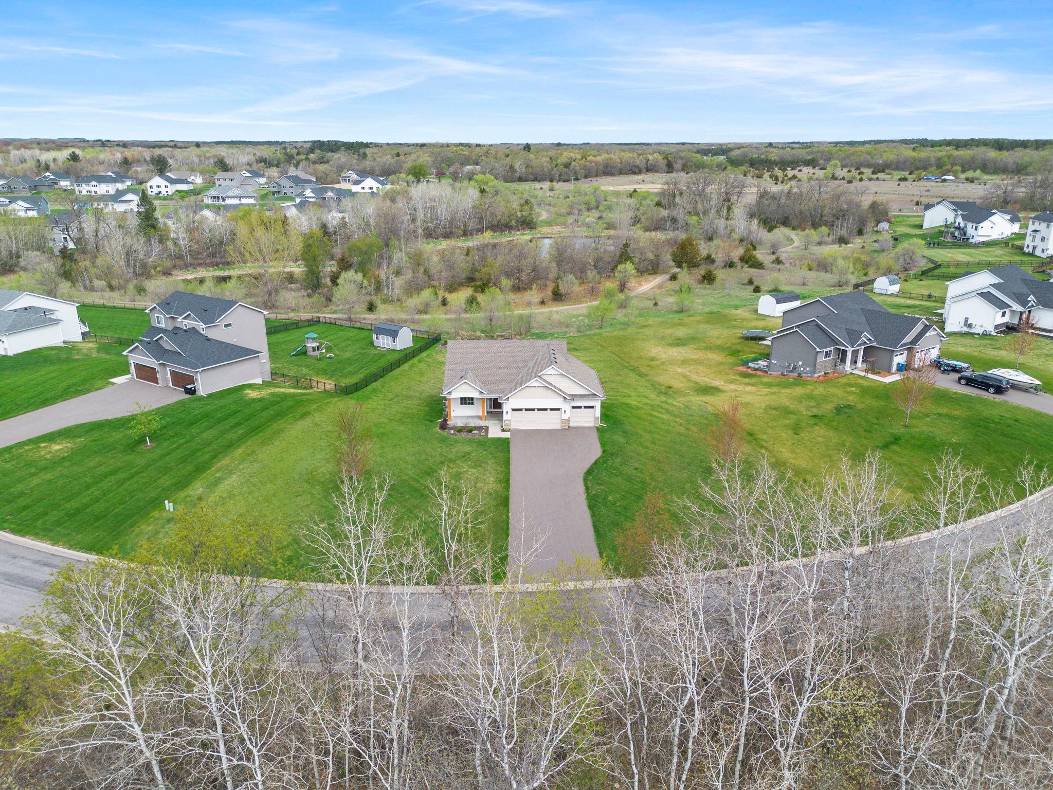 There are walking trails right outside your backyard! They wind throughout the wooded areas of this entire neighborhood and lead you to the association's lake access.