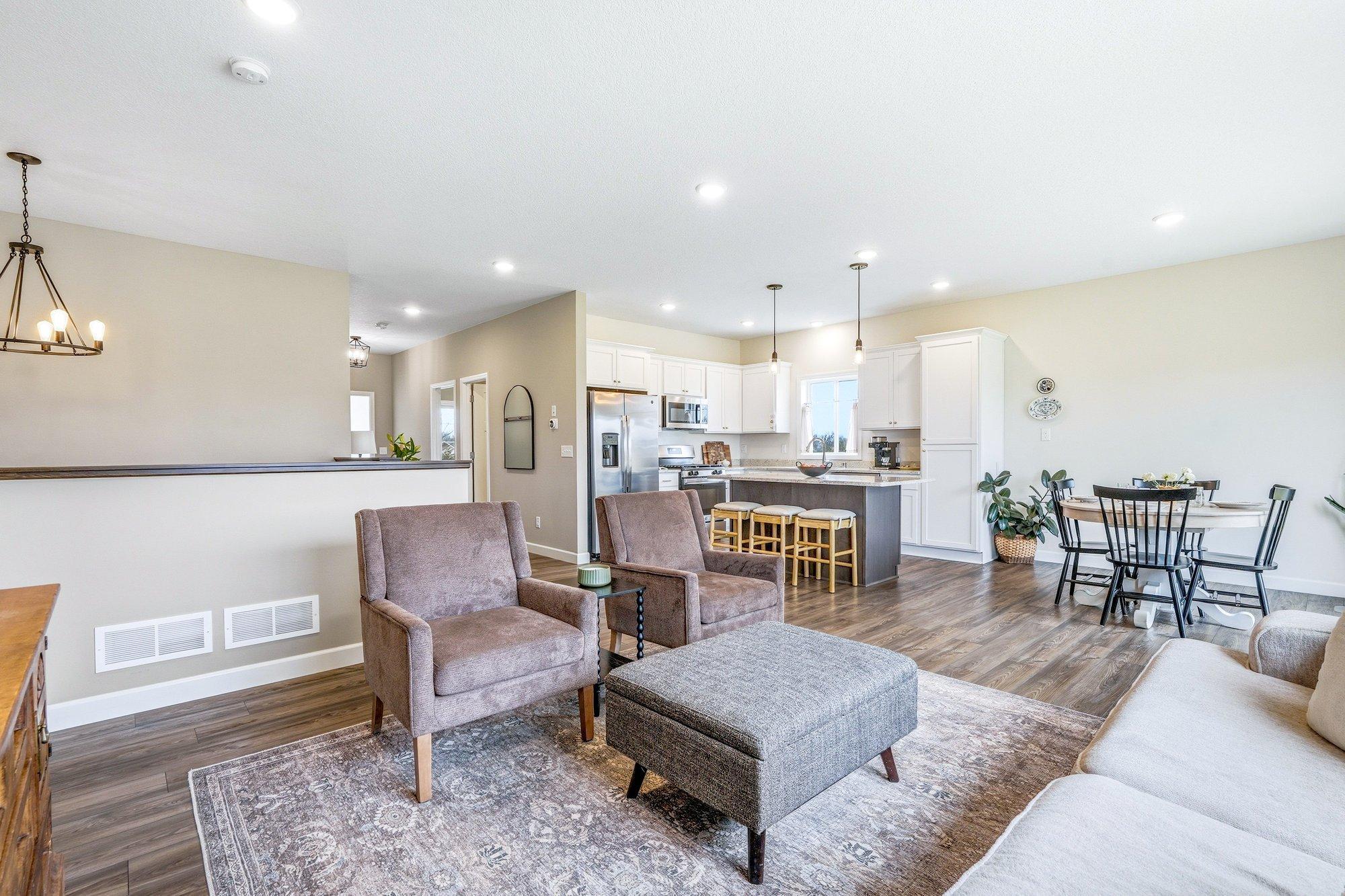 The LVP flooring travels throughout the main level common areas making this space open to many layouts.