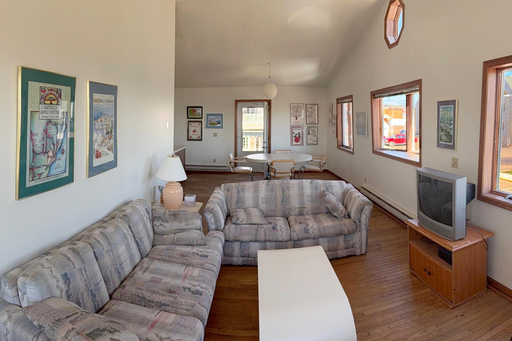 Living room/dining area leading to deck