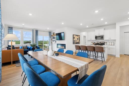 Enjoy plenty of seating at the kitchen island and dining area adjacent to the kitchen. Perfect for entertaining or having a family meal together.