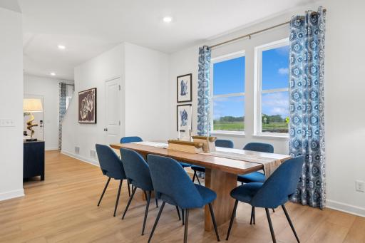 Soaked in natural sunlight, the homes eat-in dining room has ample room for a dining table located in the heart of the home.