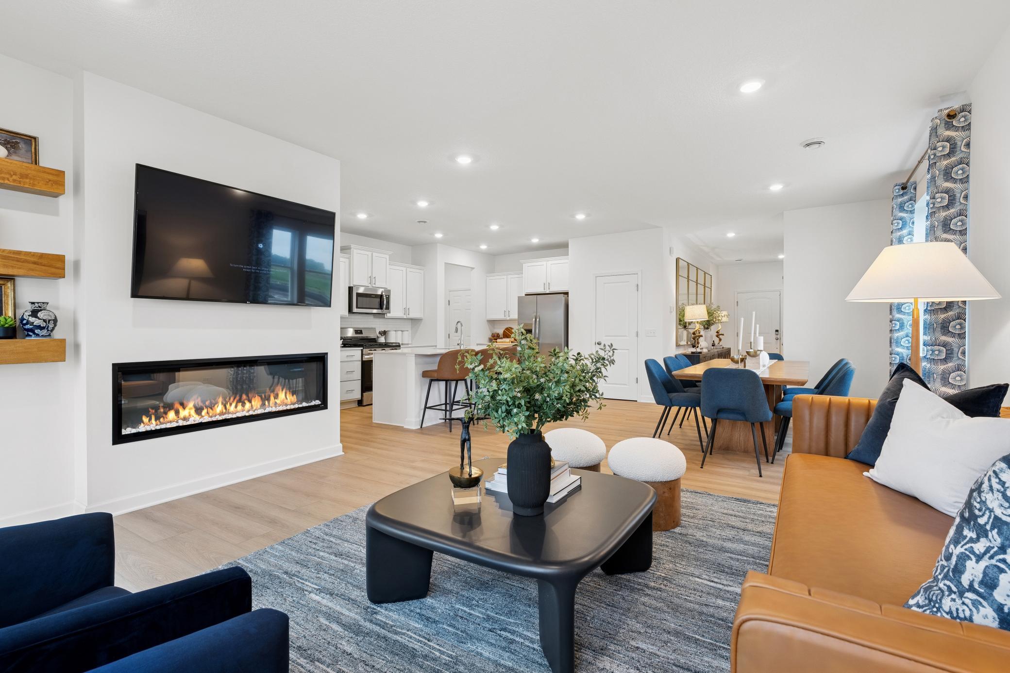 The expansive kitchen area transitions seamlessly into the open and spacious family room area.