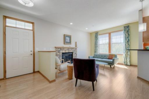 Generous size living room with gas fireplace