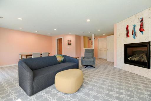 Another view of family room with real coral surround gas fireplace