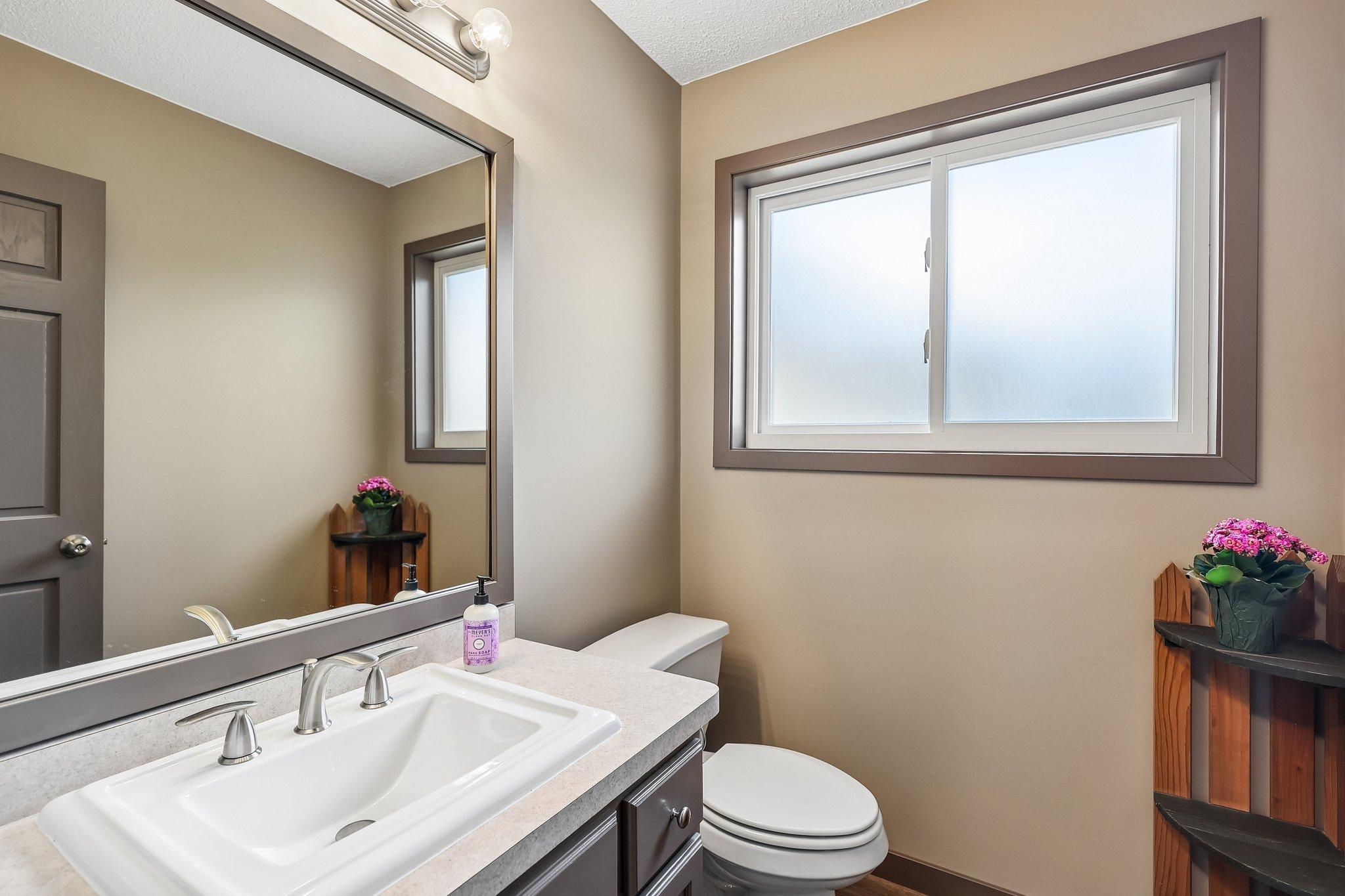 Updated half bathroom on the main level.