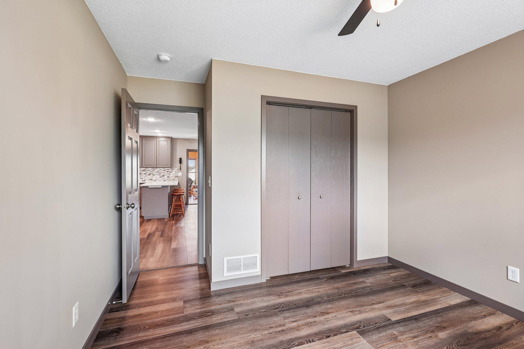 View from the main level bedroom to the kitchen.