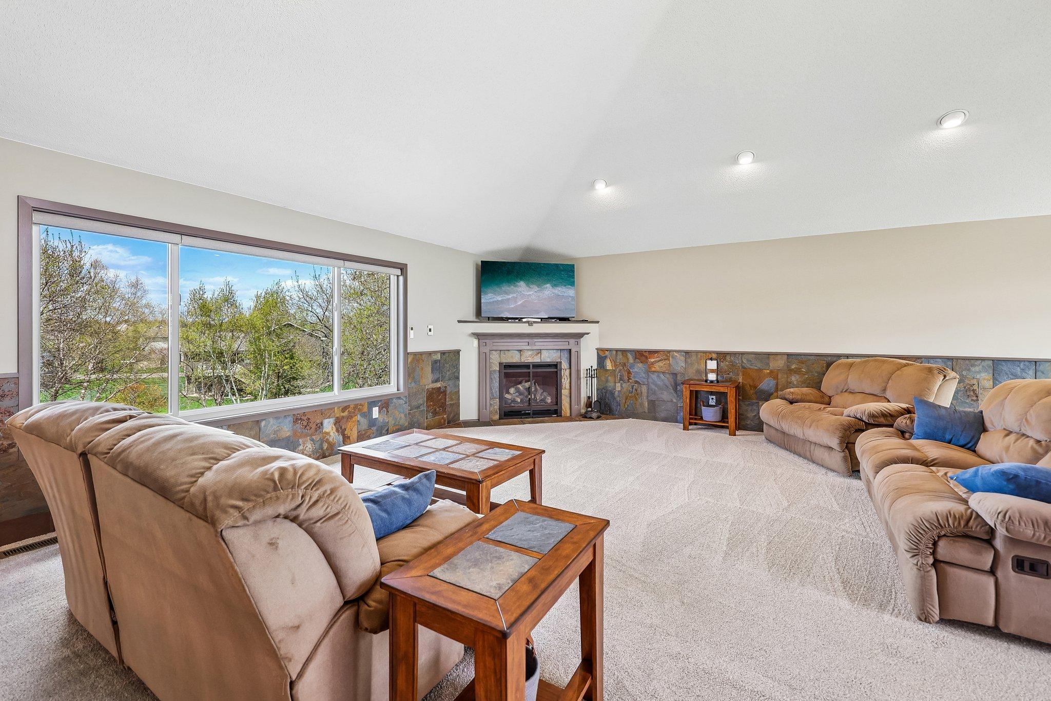 Relax by your gas fireplace and oversized windows.