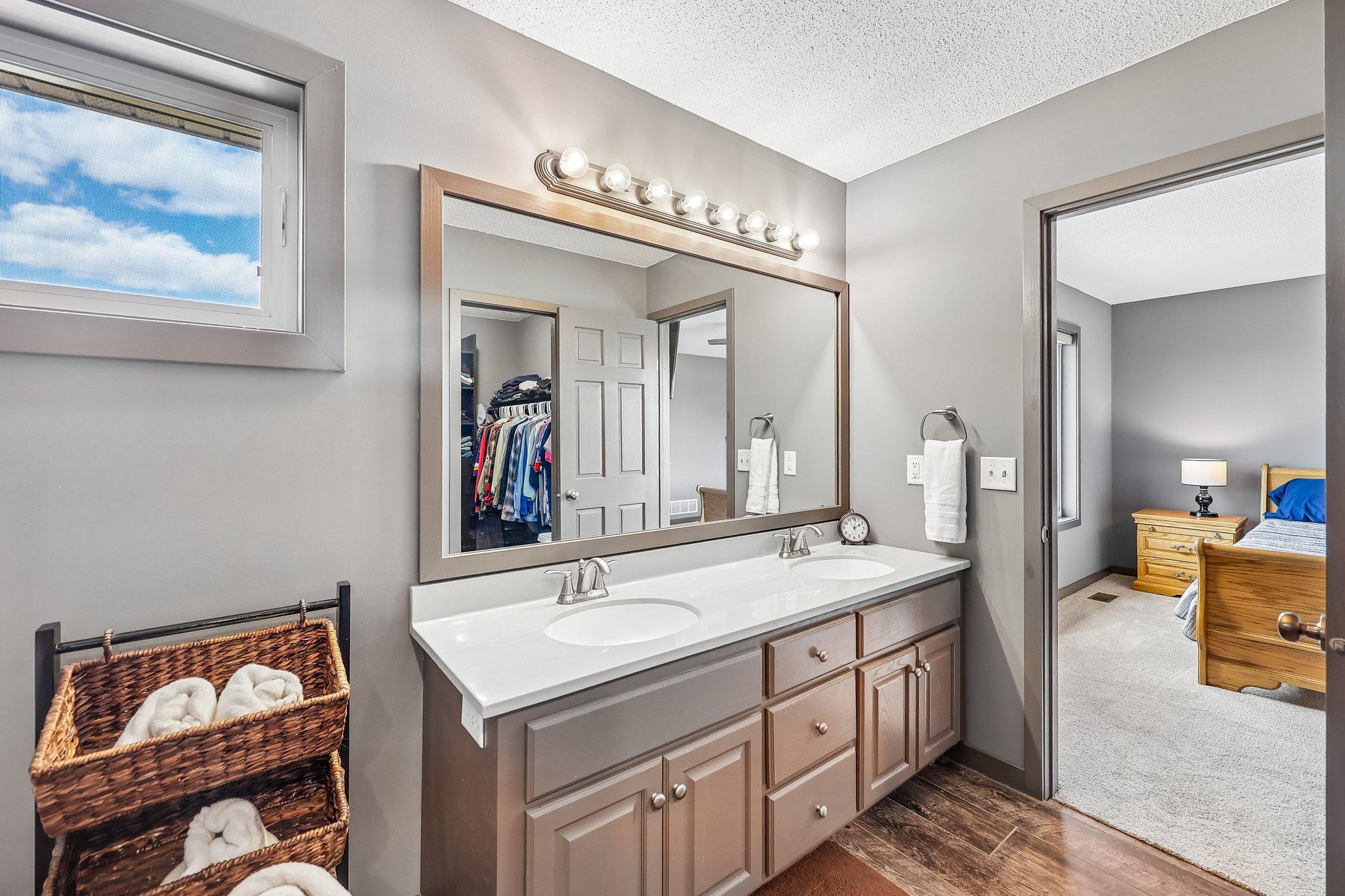 View from Owners Bath to Owners Bedroom.