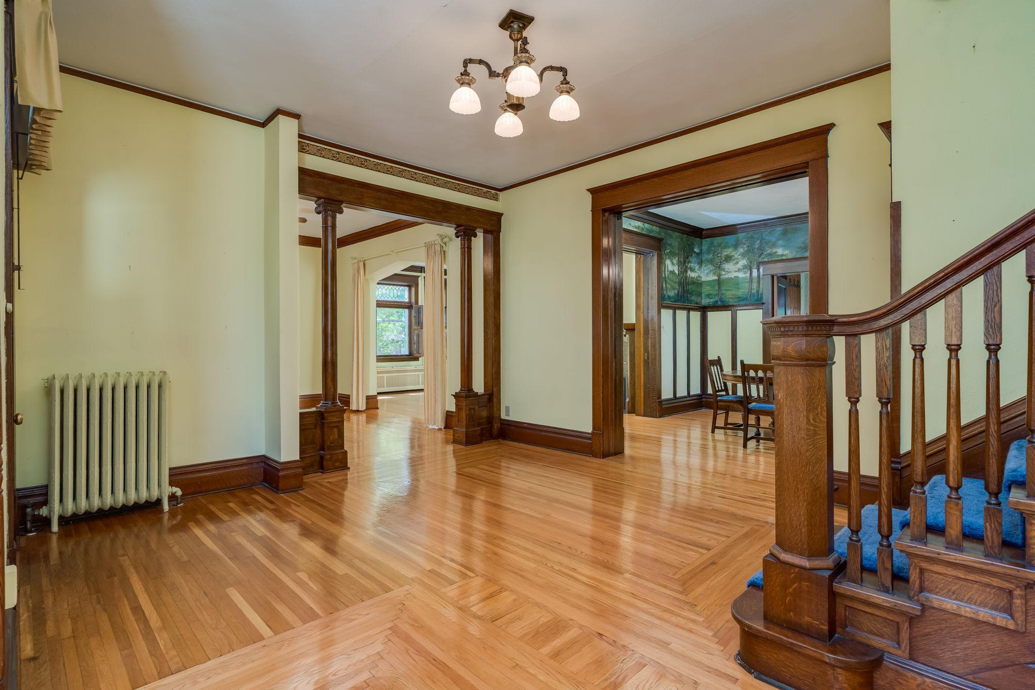 From the side entrance looking into the second family room and formal dining
