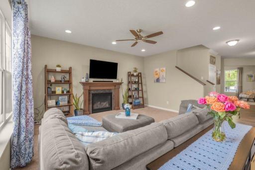 Wide open living room complete with gas fireplace.