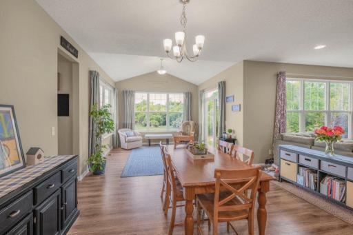 Kitchen leads to the dining space and to the sun-filled beautiful sunroom