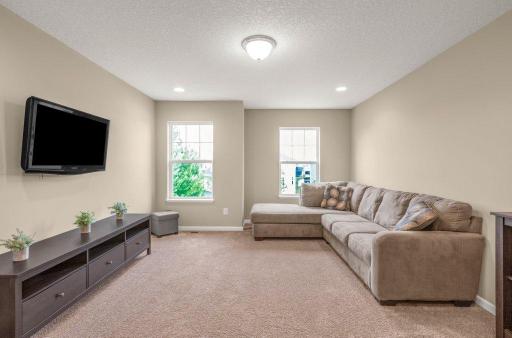Upper level loft area offer another gathering space allowing time to finish the lower level walkout when and how you choose