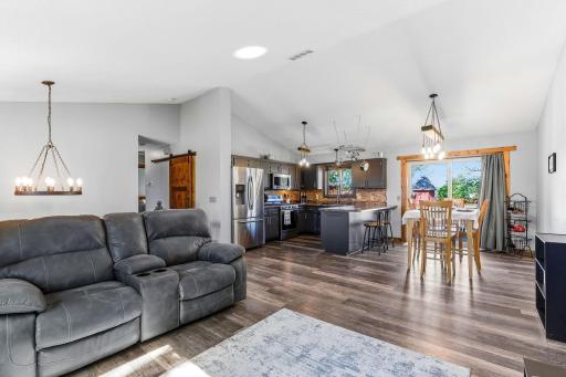 You will love this great open floor plan with skylights and barn door pantry