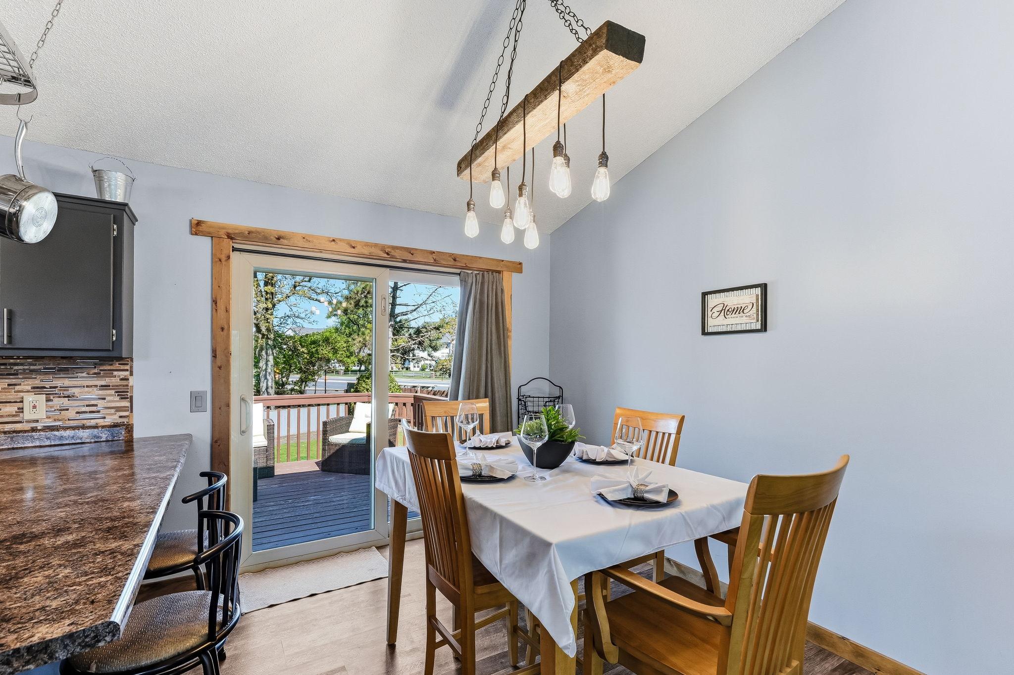 Custom lighting and trim throughout the main level of the home