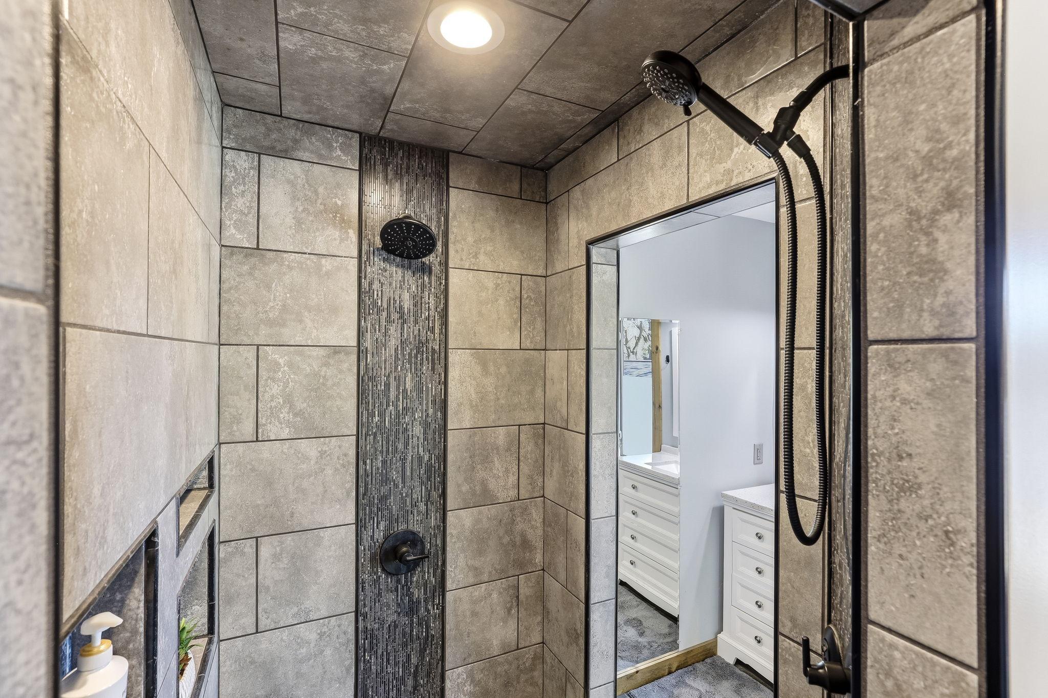 Walk-in shower with double shower heads and jets for your showering comfort