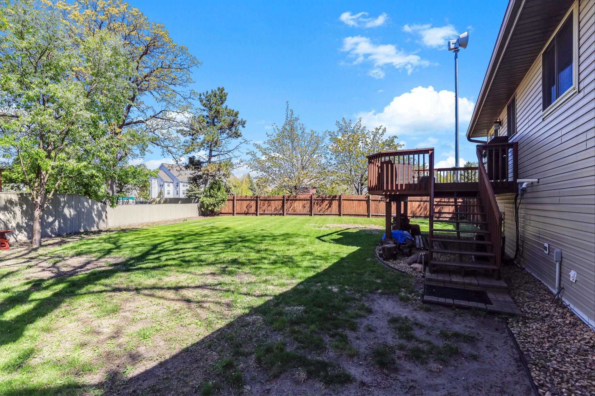 Large back yard just waiting for your imagination & green thumb! Great space to add a garden