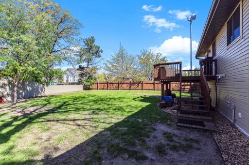 Large back yard just waiting for your imagination & green thumb! Great space to add a garden