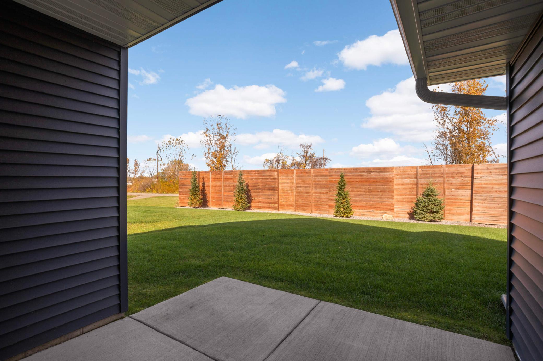 Private patio overlooking the quiet back yard