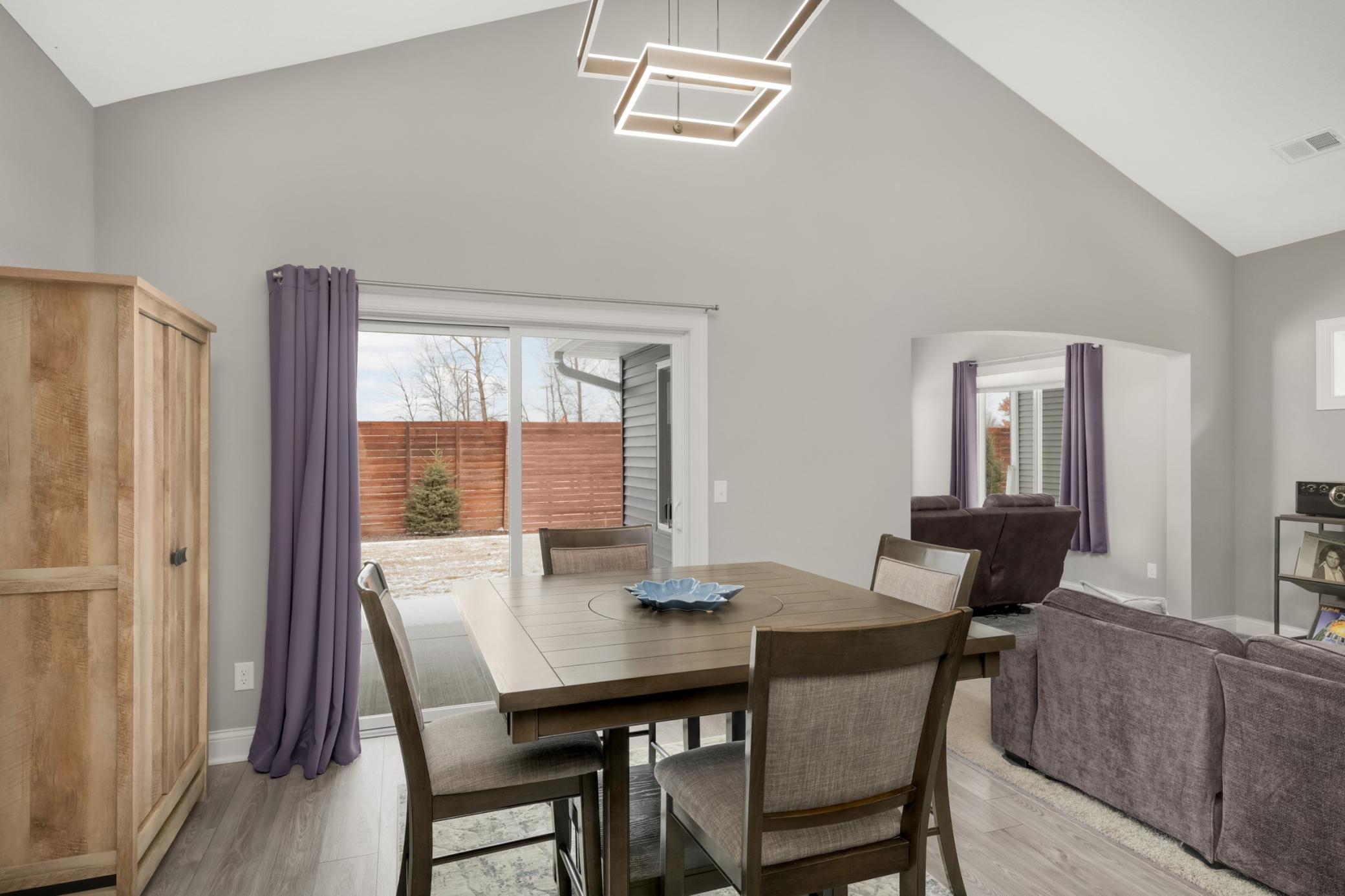Dining area with walkout to the private patio