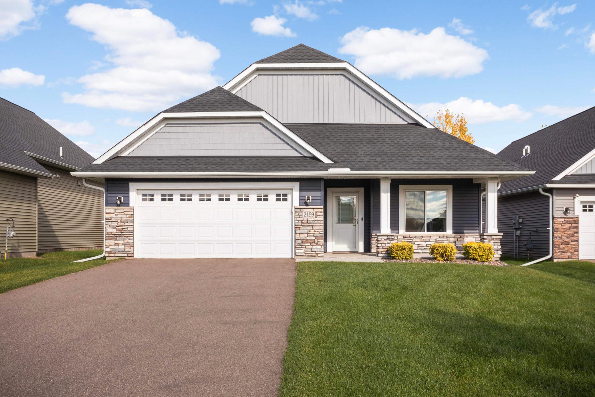 Located on a quiet dead end street in the high demand East Side Villas of Lino Lakes