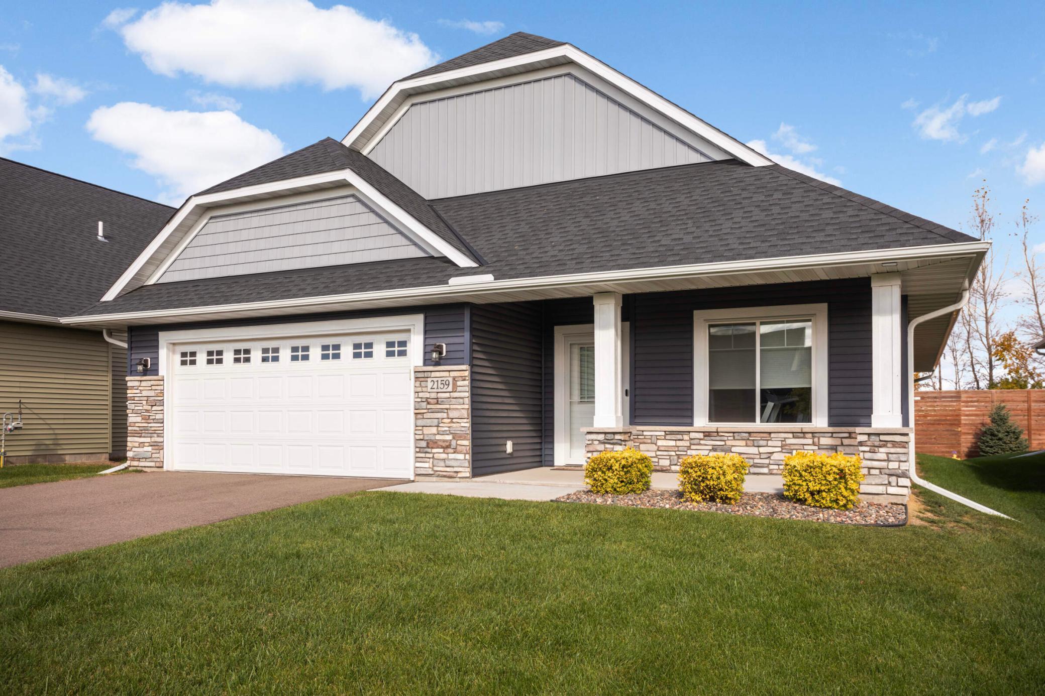 Located on a quiet dead end street in the high demand East Side Villas of Lino Lakes