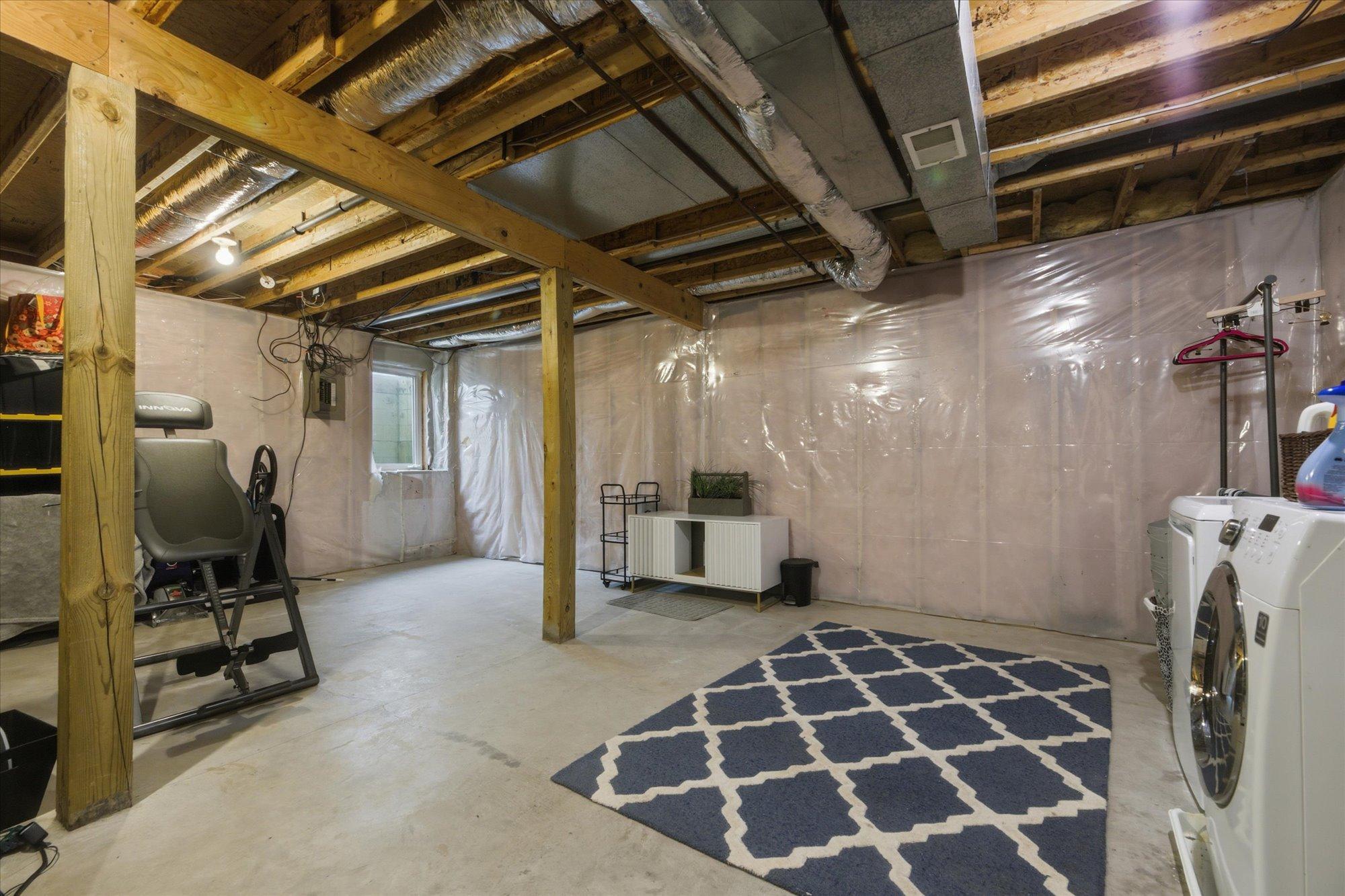 4th level unfinished basement with egress window for a 4th bedroom