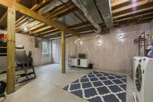 4th level unfinished basement with egress window for a 4th bedroom