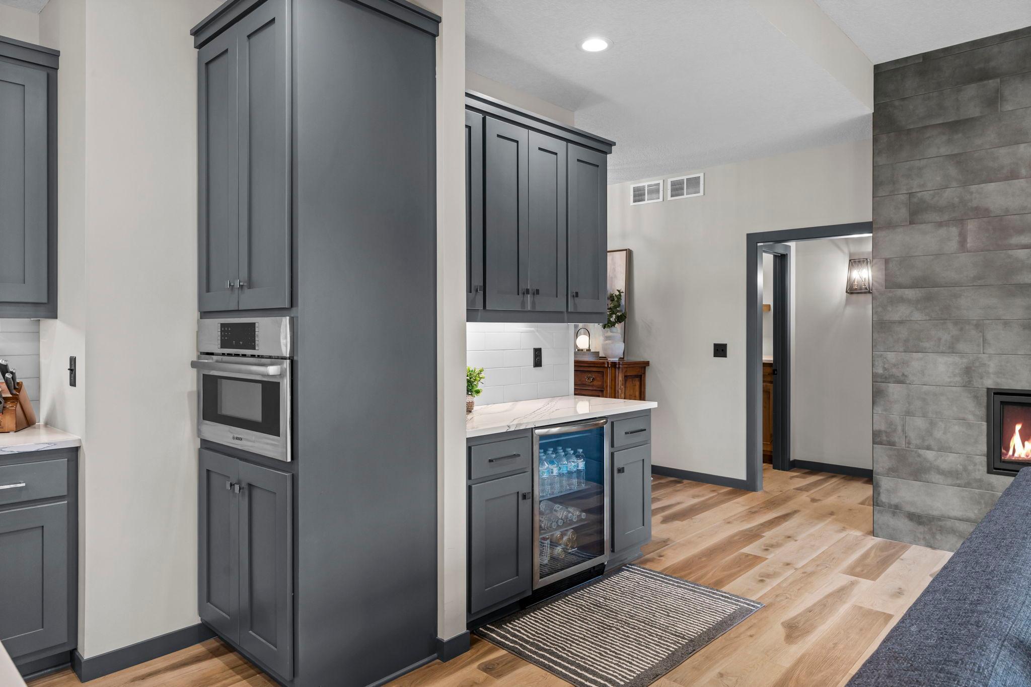 The kitchen includes a convenient beverage station