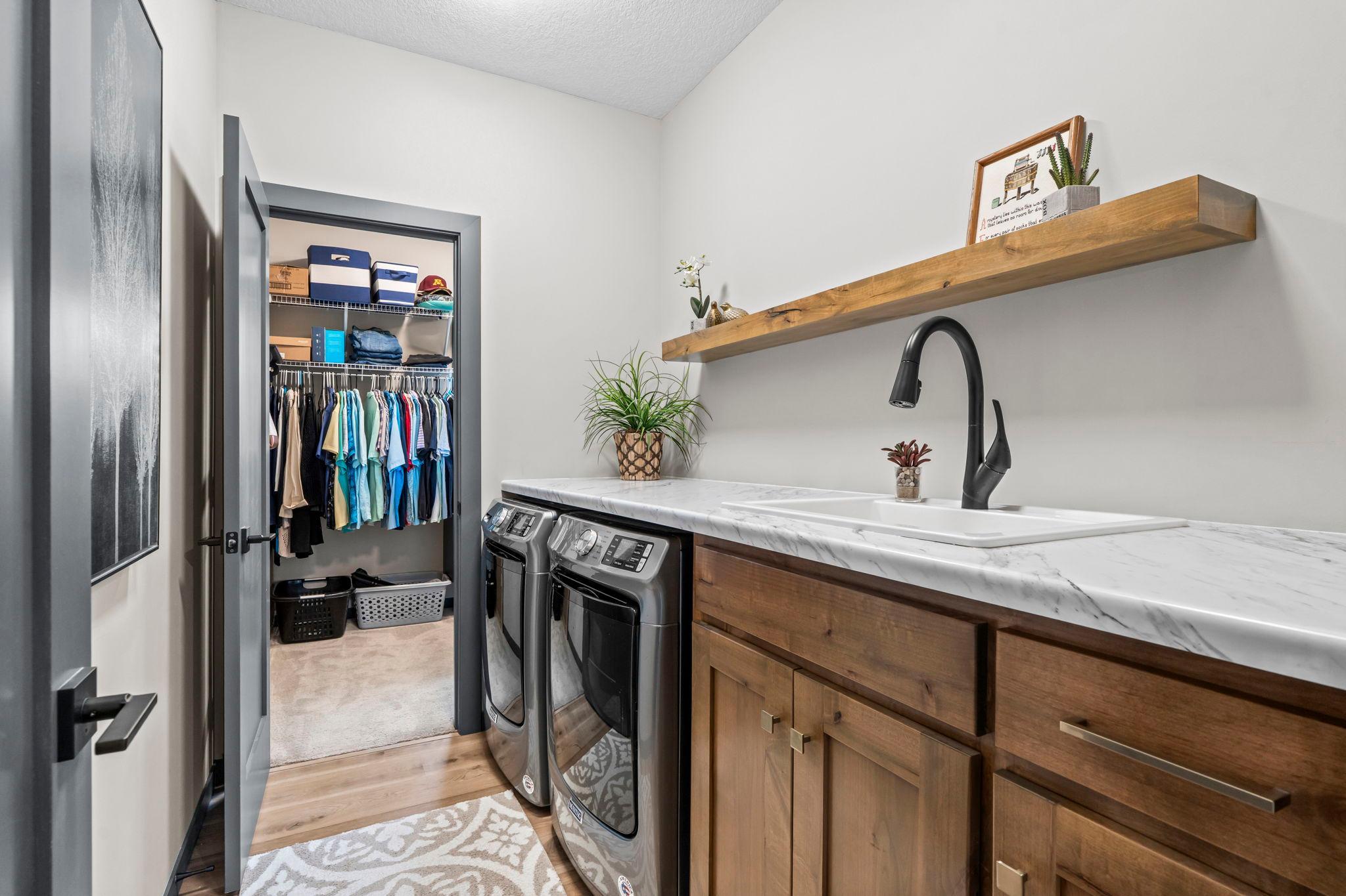 Laundry room connects right to the primary closet
