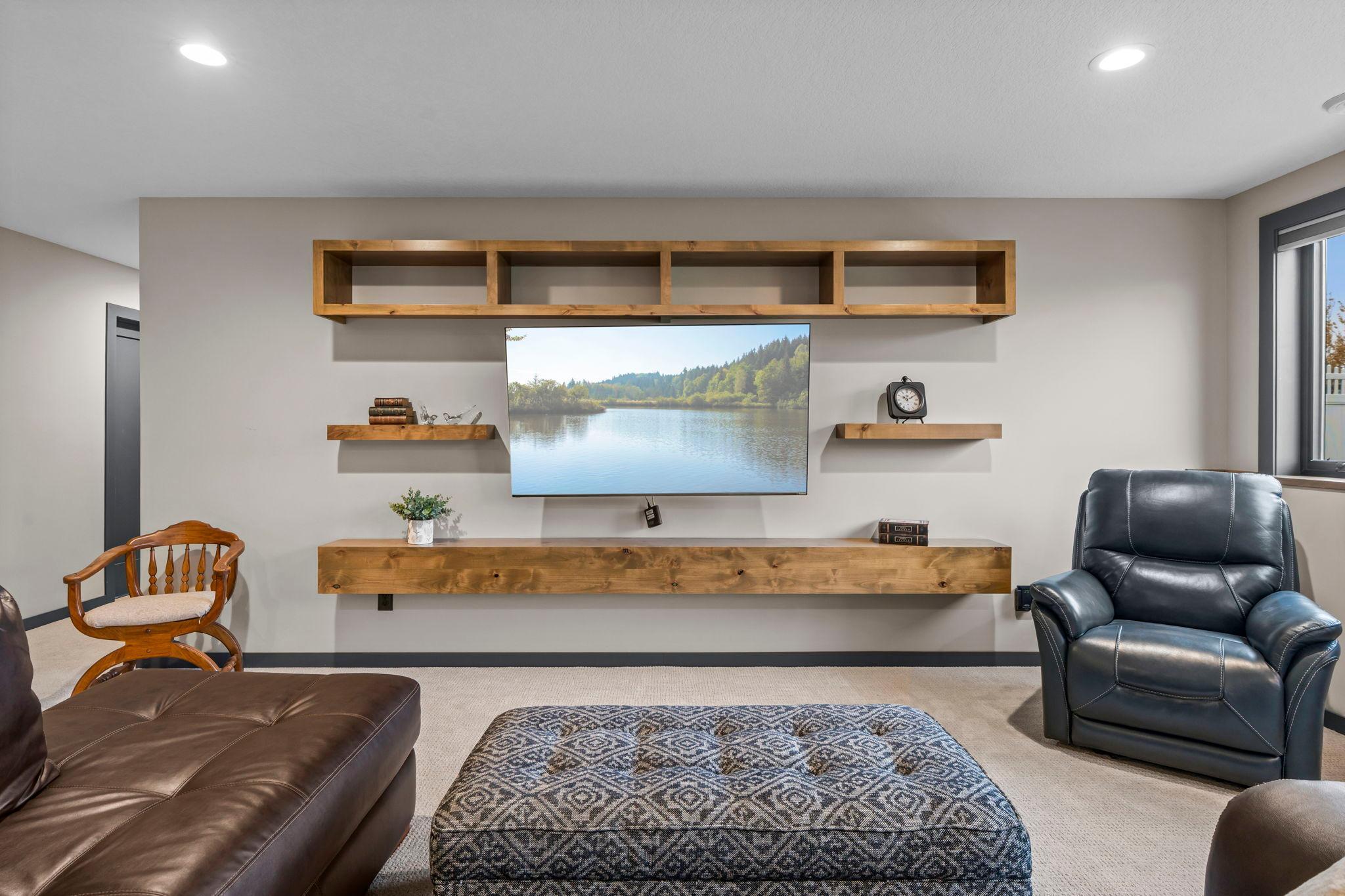 Stylish built-in shelving accentuates the family room