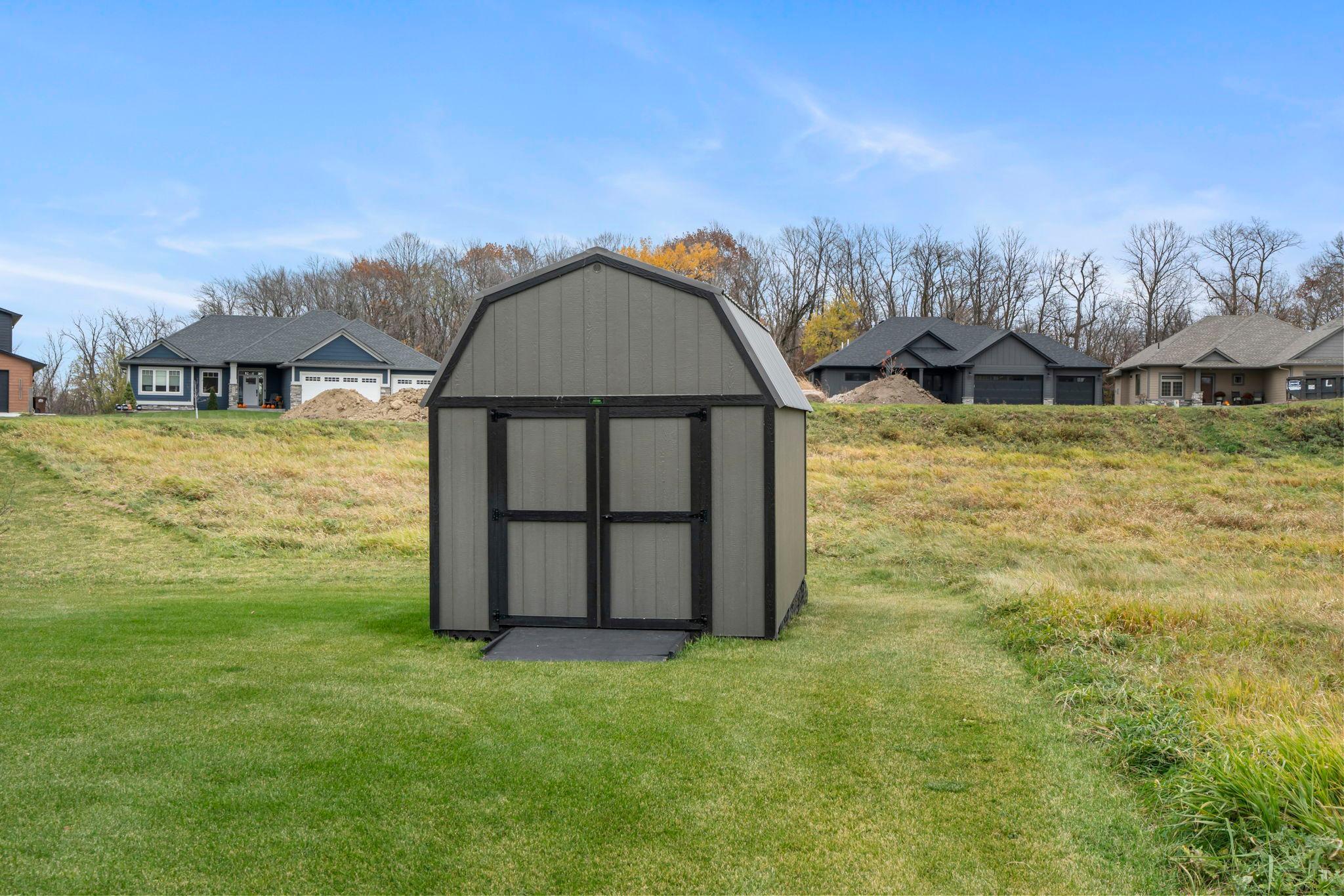 Keep your tools and lawn gear neatly organized in the backyard’s handy storage shed