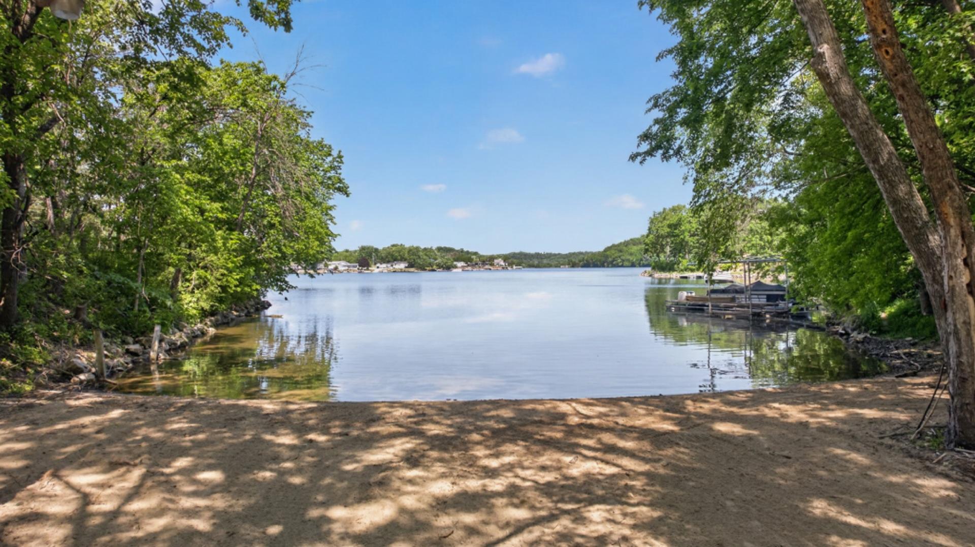 The property includes shared ownership with Harbo Hills residents of approximately 2.75 acres along Lake Zumbro. Includes; waterfront area (approximately 75 feet of beachfront), a picnic shelter, and space for storing boats and other watercraft.
