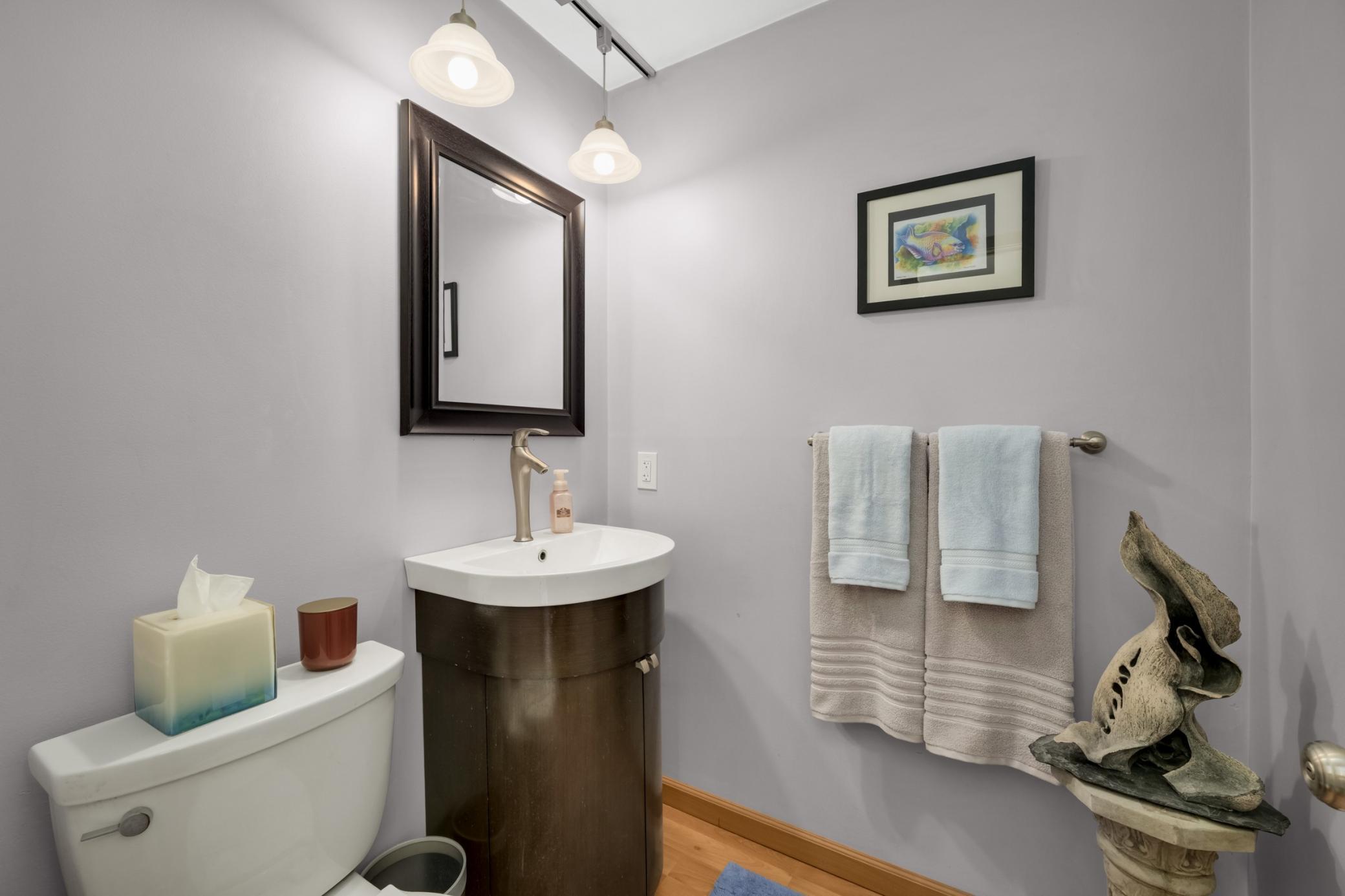 The main floor features a lovel 1/2 bathroom