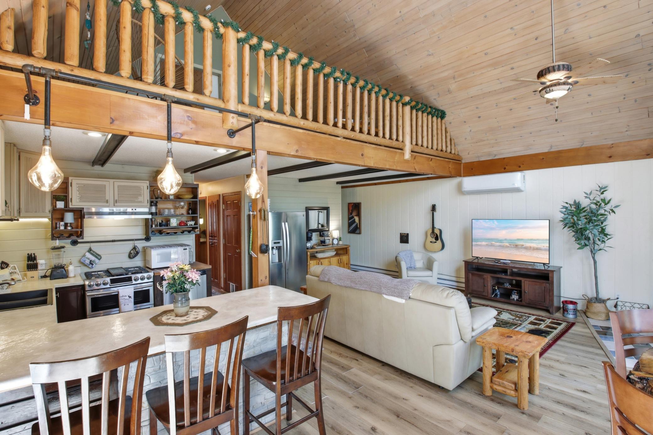 A log railing system enhances the Northwoods charm.