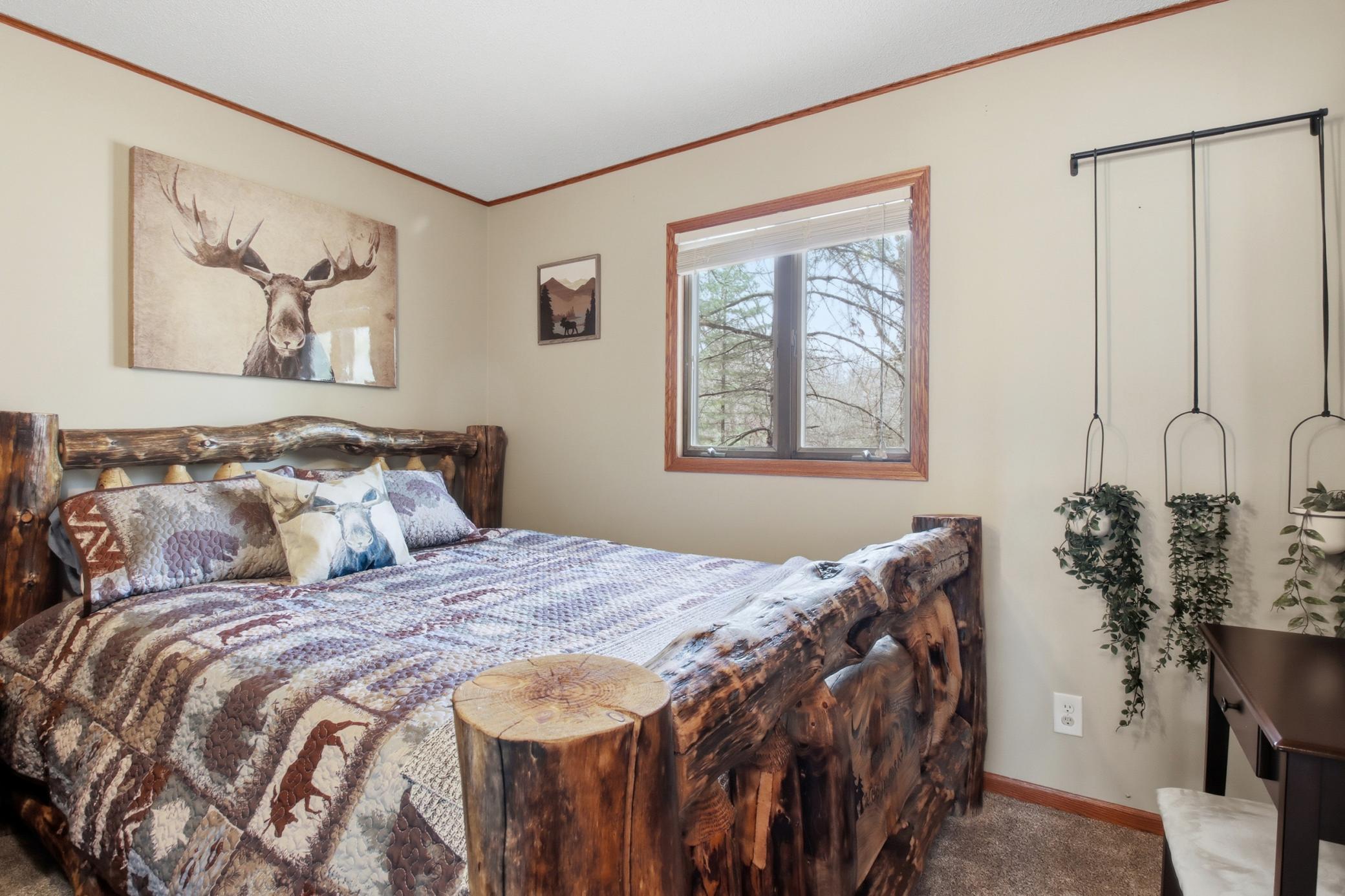 Second main floor bedroom. The owners may be selling the furnishings separate from the sale.