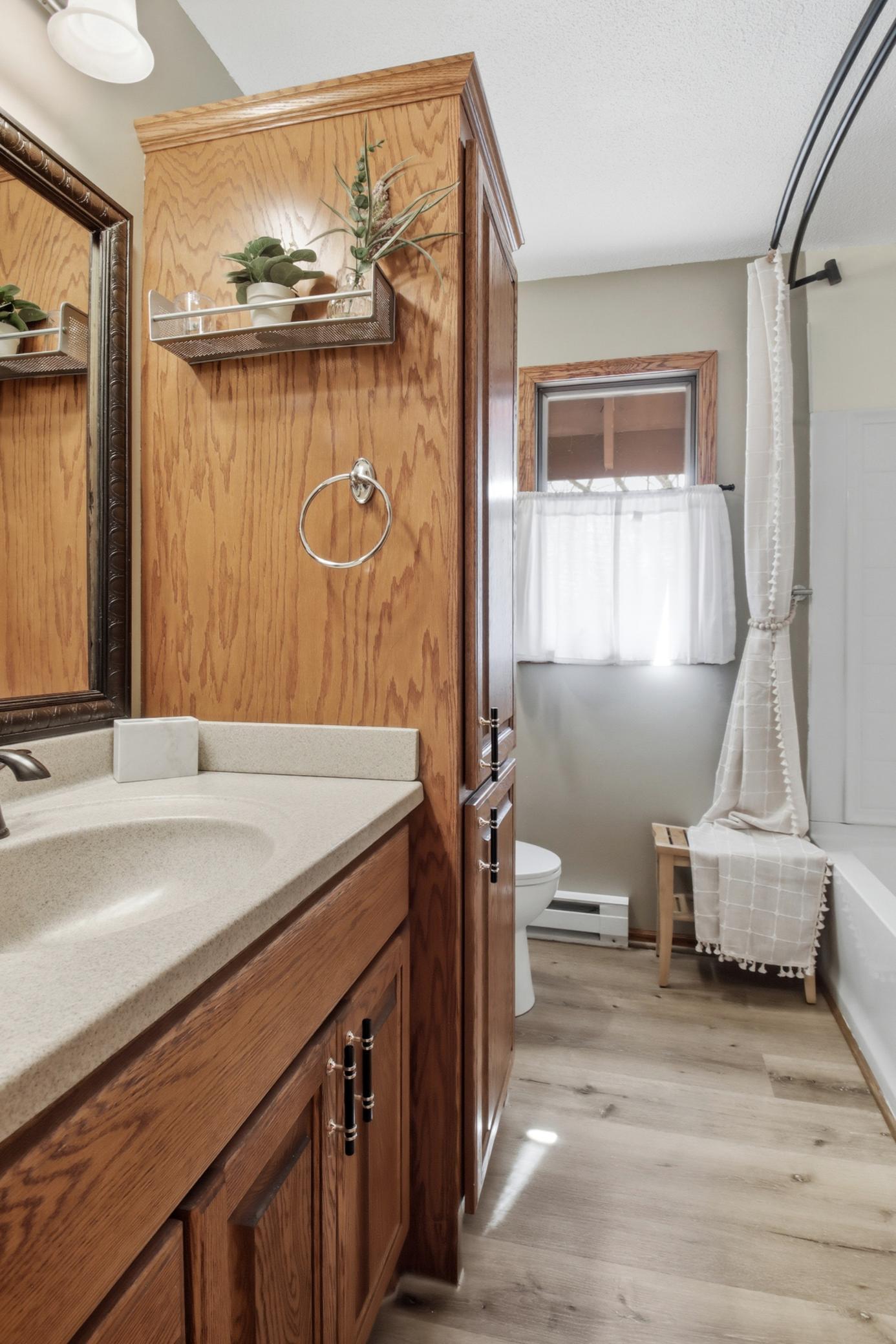 Main level offers a full bath with tub.