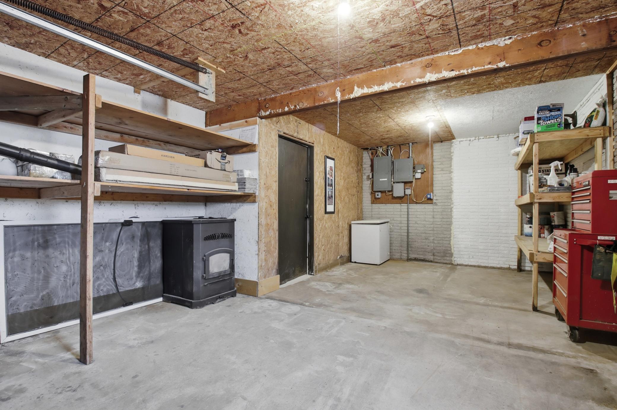 There is a vintage wood stove that can be reconnected in the living room. This will be included and the buyer can decide how to utilize it.