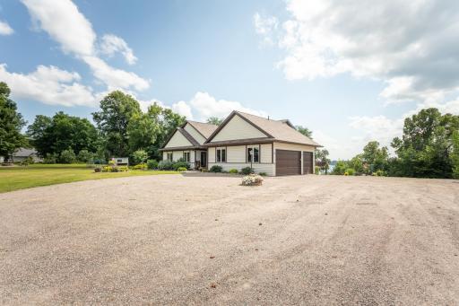 Whether you're hosting family and friends or storing recreational vehicles, the spacious driveway offers exceptional flexibility and parking capacity
