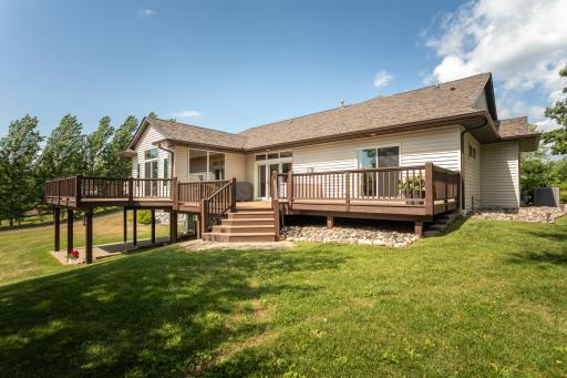 Outdoors enjoy the massive deck and covered patio