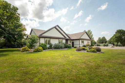 This beautiful home welcomes you with exceptional curb appeal, enhanced by updated landscaping and numerous improvements both inside and out