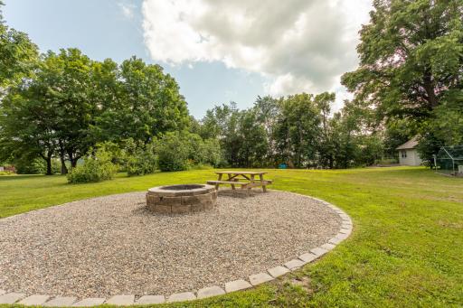 Enjoy the spacious firepit on warm summer evenings