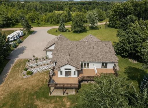Expansive deck and covered patio offer great space to relax and entertain