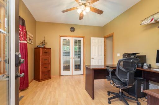 French doors and natural light create a flexible space that feels separate yet connected