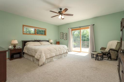 A spacious primary suite designed to be a peaceful retreat at the end of the day, and even includes access to the deck