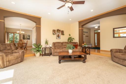 Living room seamlessly connects to the dining and kitchen