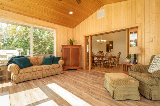 Warm wood finishes and abundant natural light make this room especially inviting