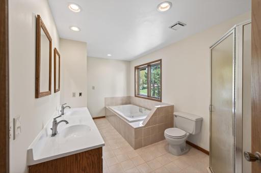Upper level bath has separate shower and jet tub.